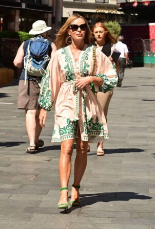 Amanda Holden - In a high split short patterned dress art Heart radio in London