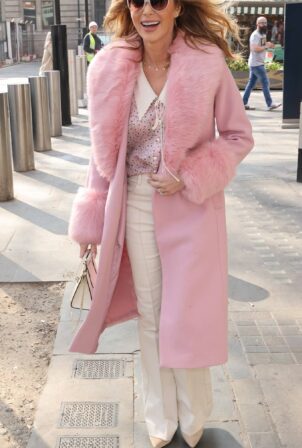 Amanda Holden - In a pink fur lined coat seen at Heart radio in London