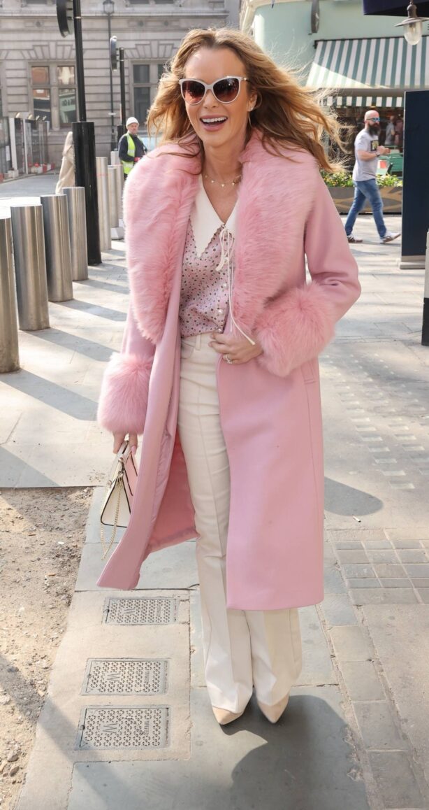 Amanda Holden - In a pink fur lined coat seen at Heart radio in London