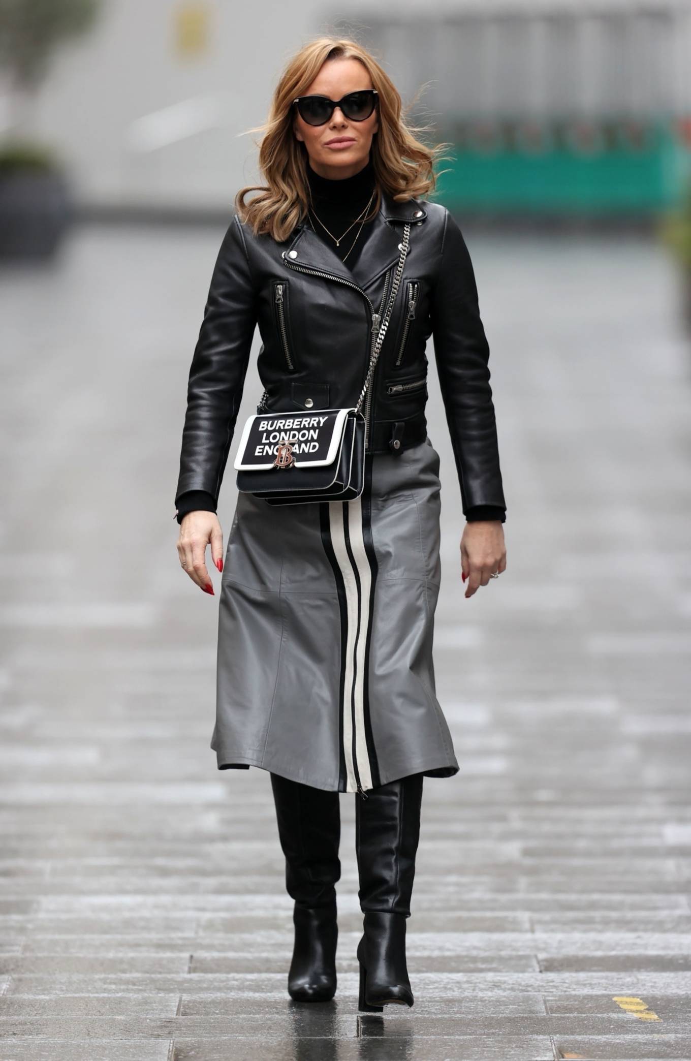 Amanda Holden – In a Sosandar skirt and Dune London Boots in London ...