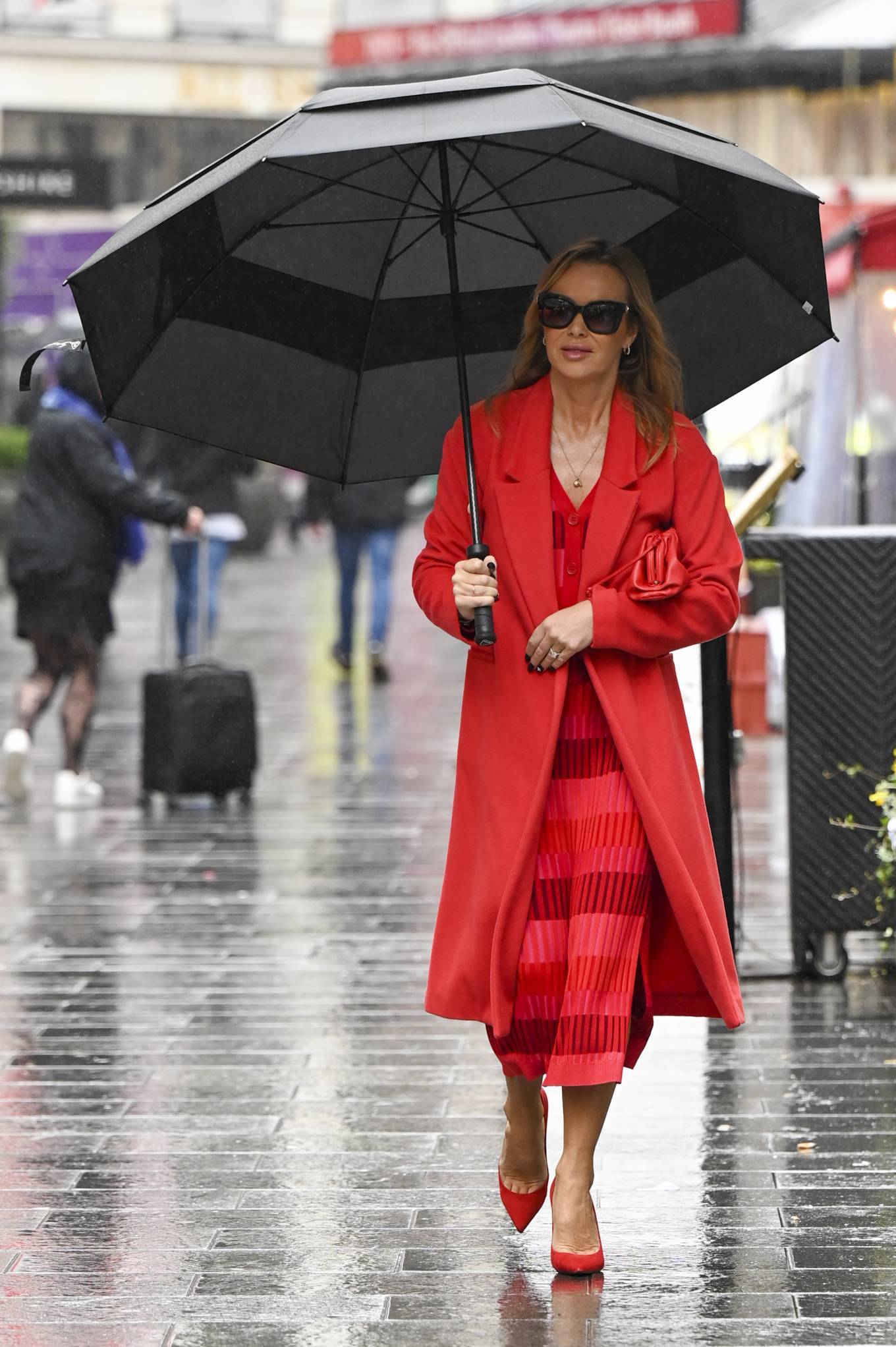 Amanda Holden - In red Seen leaving Global Studios in London