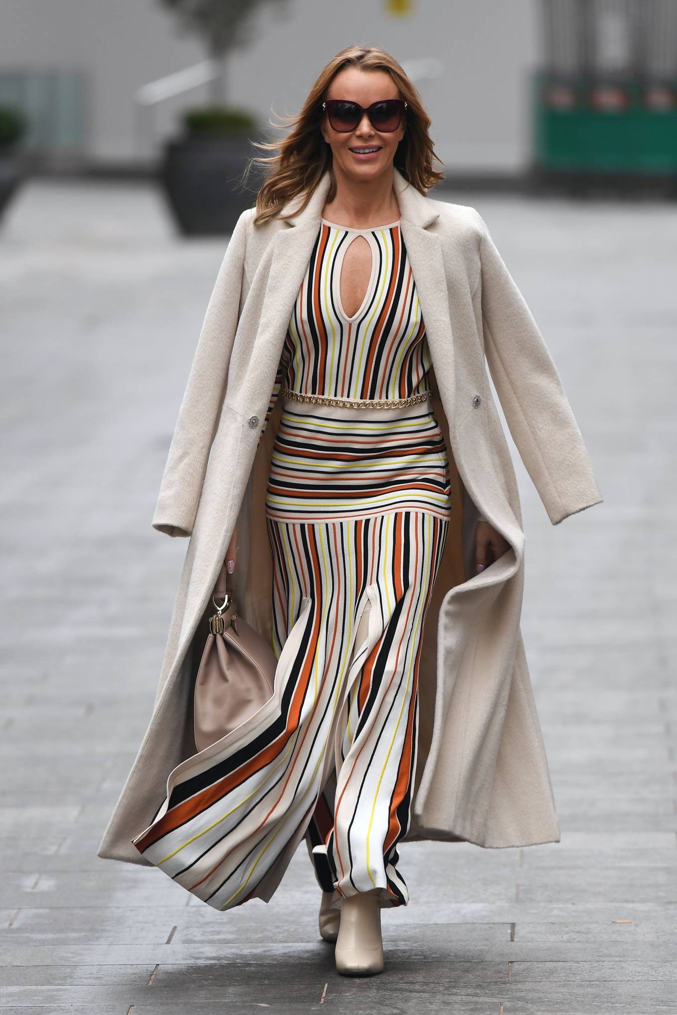 Amanda Holden – In striped dress and knee high boots in London