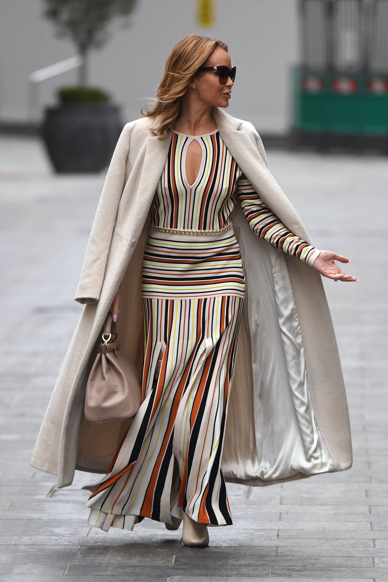 Amanda Holden – In striped dress and knee high boots in London