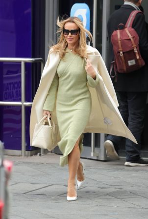 Amanda Holden - Showing off her slim figure in a tight green dress in London