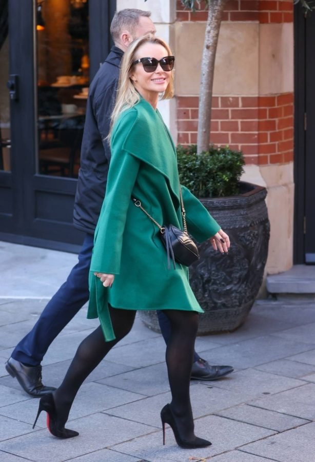 Amanda Holden - Wearing a stylish green minidress in London