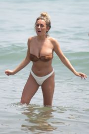 Amber Davies in Bikini on the beach in Marbella
