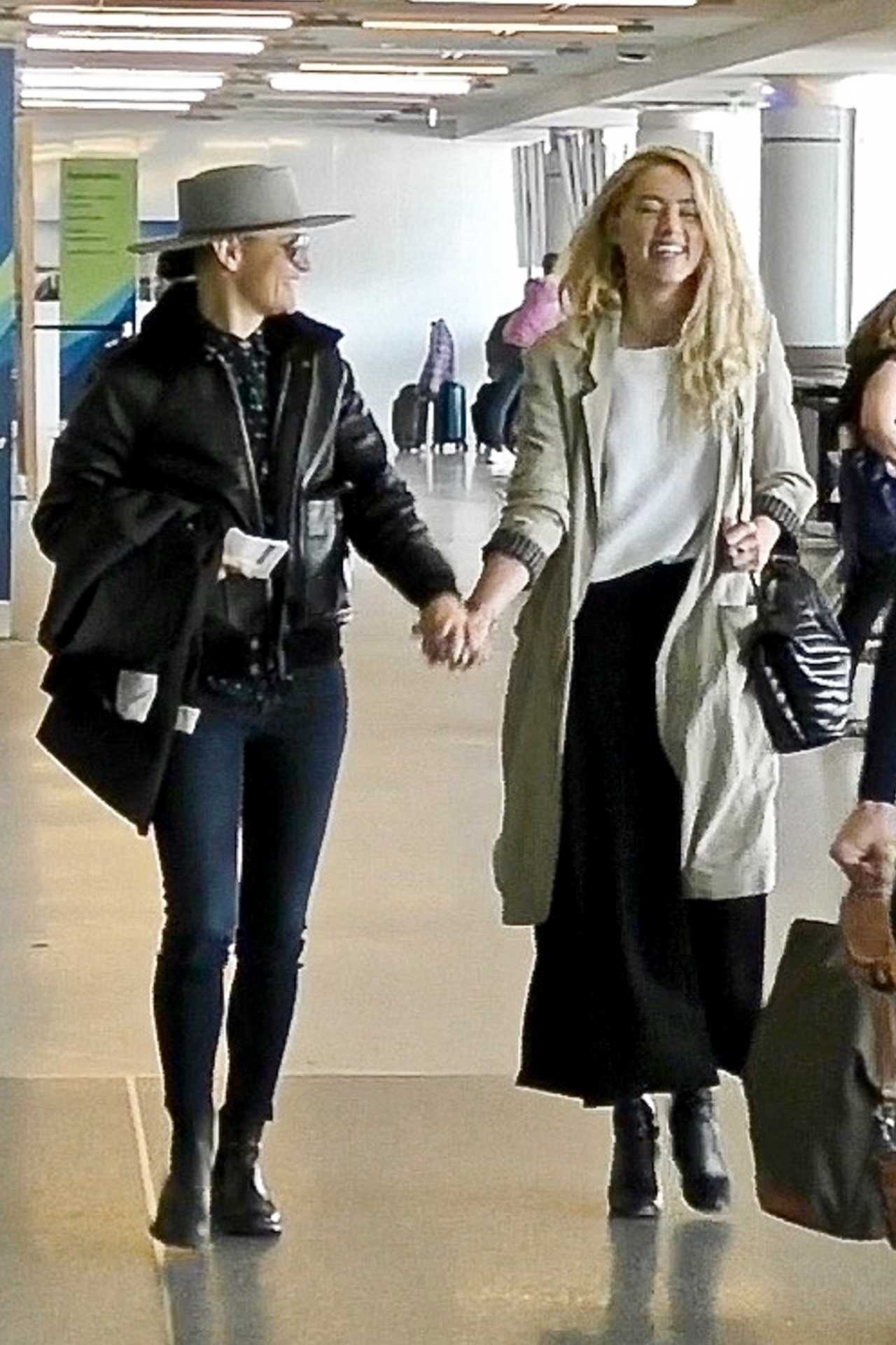 Amber Heard and Bianca Butti depart from LAX-16 | GotCeleb