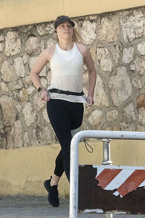 Amber Heard - Going for a run near her now home in Madrid
