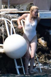 Amber Heard in White Swimsuit on holiday in Amalfi Coast