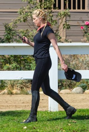 Amber Heard - Pictured horseback riding in Los Angeles