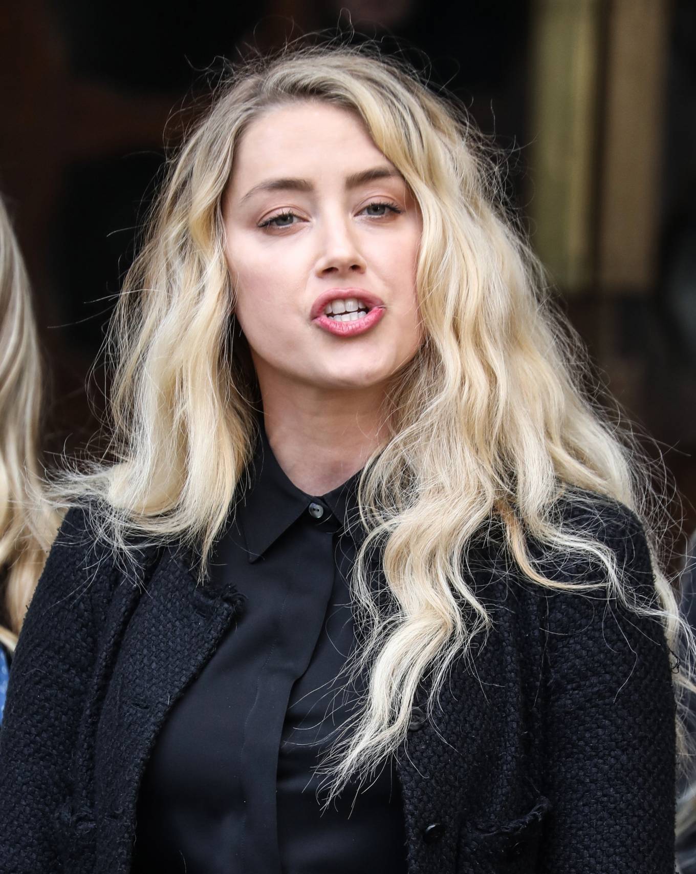 Amber Heard - Pictured while giving A Statement Outside The Royal ...