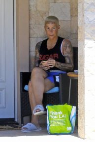 Amber Rose and Alexander Edwards - Seen in front of her home