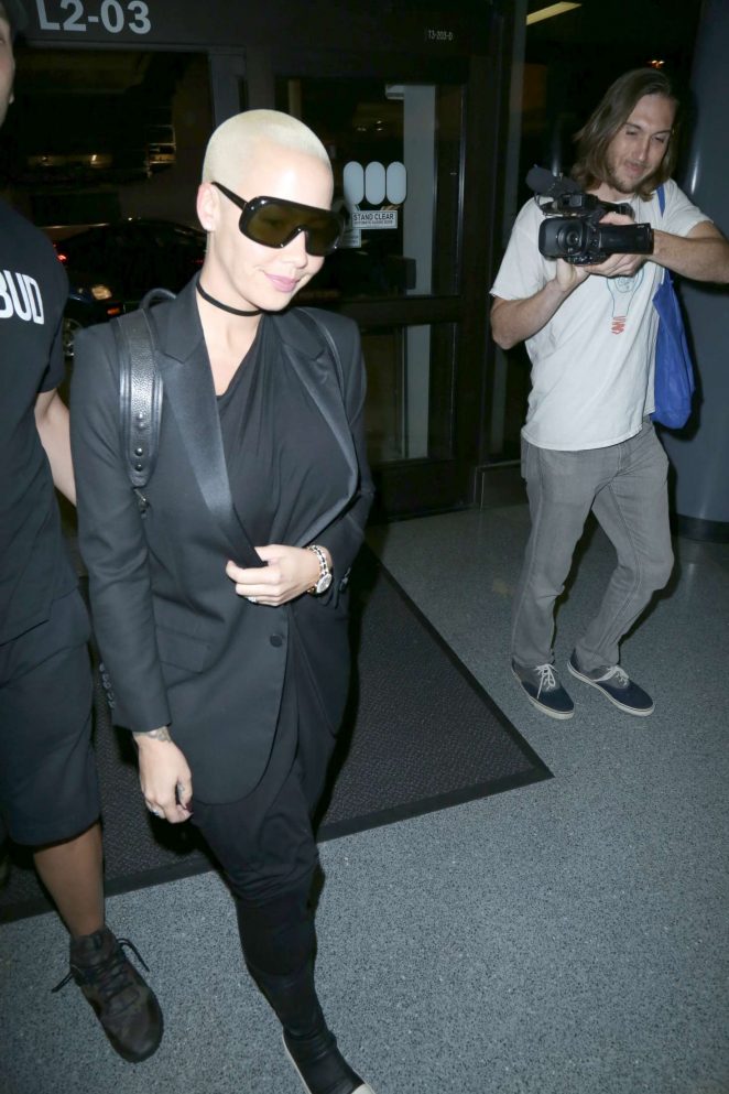 Amber Rose in Black at LAX airport in Los Angeles
