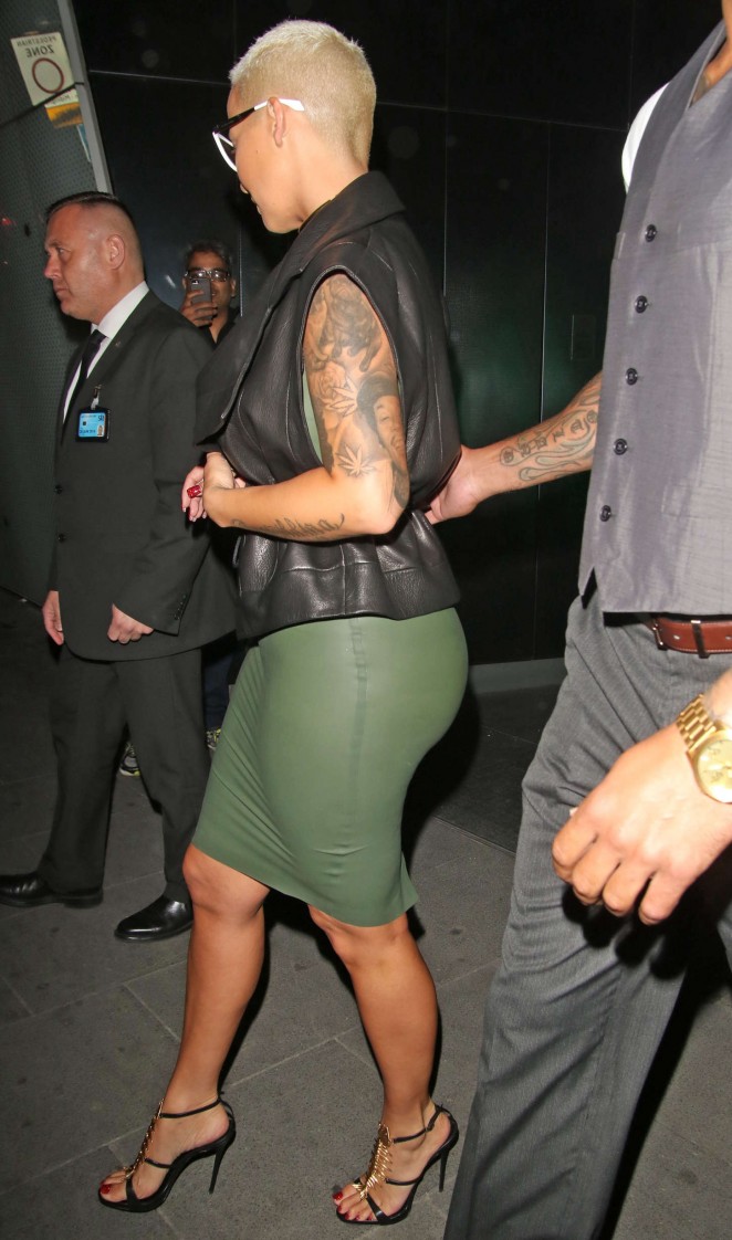 Amber Rose in Tight Dress Out in London