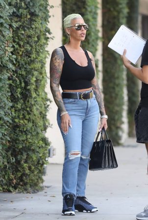 Amber Rose - Wearing blue denim jeans while out in West Hollywood