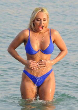 Amber Turner in Blue Bikini on the beach in Dubai
