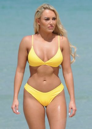 Amber Turner in Yellow Bikini on the beach in Dubai