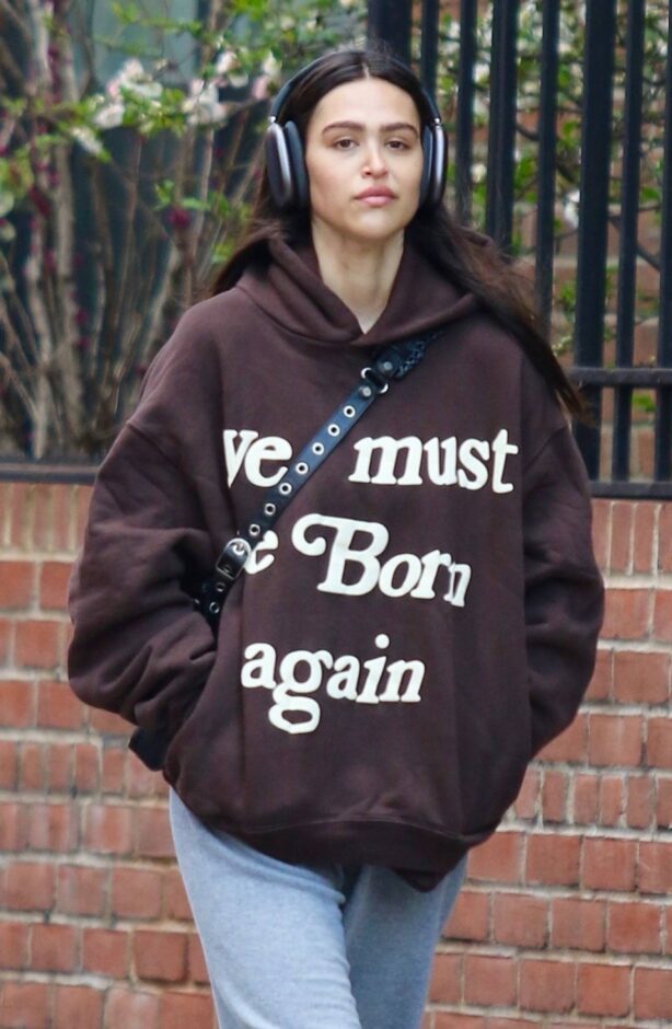 Amelia Hamlin - Dons 'We Must Be Born Again' hoodie around Manhattan’s Soho area