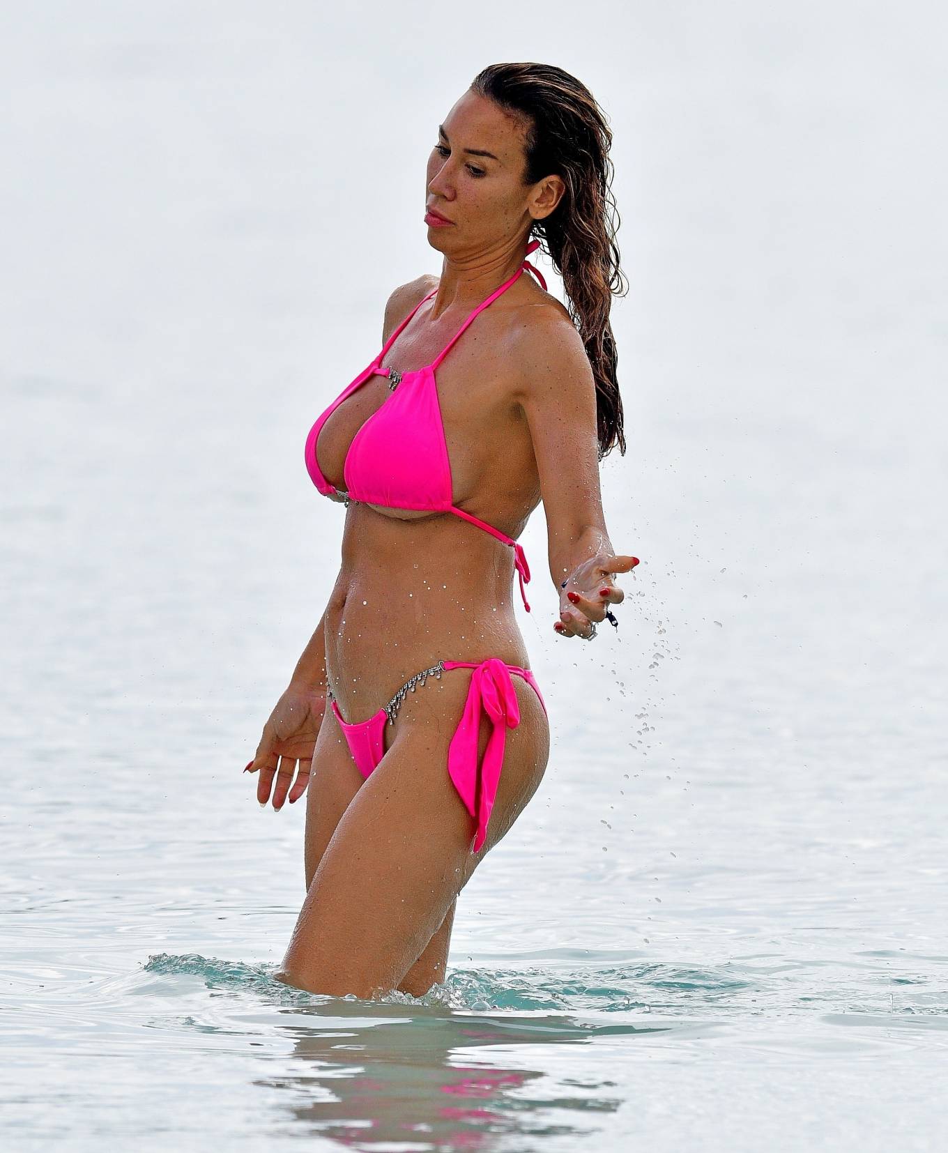 Ampika Pickston - Seen in pink bikini on the beach in Barbados