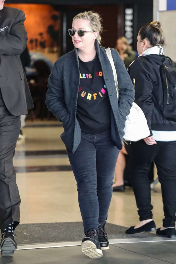 Amy Poehler - Arrives at LAX International Airport in LA