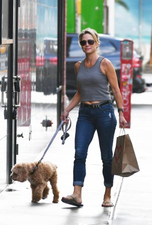 Amy Robach - Steps out with her dog in New York
