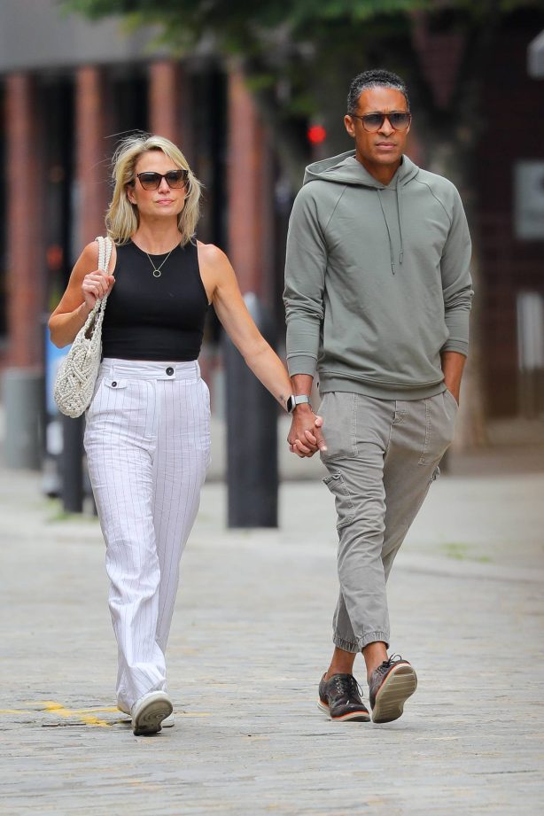 Amy Robach - With TJ Holmes hold hands as they walked through NYC