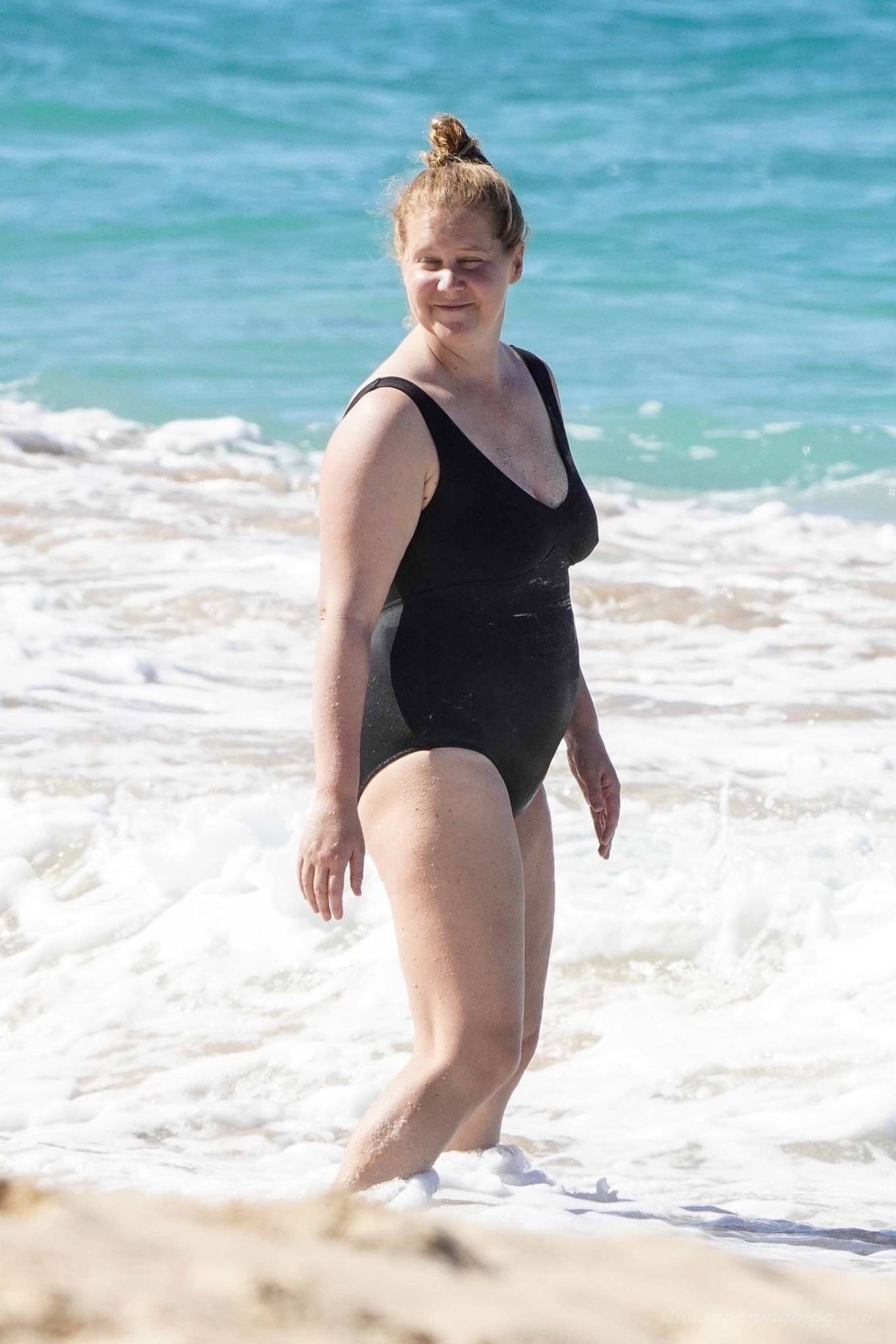 Amy Schumer – In a bikini on a Christmas day at the beach in St. Barths