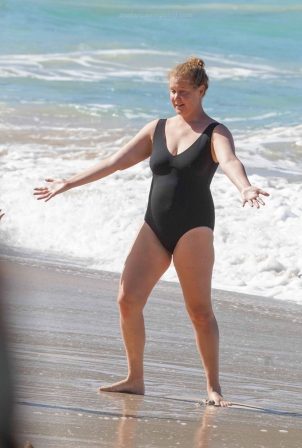 Amy Schumer - In a bikini on a Christmas day at the beach in St. Barths