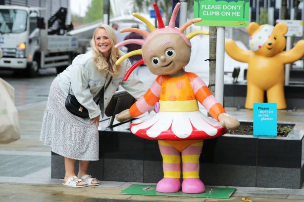 Amy Walsh - Have a picture with a Upsy Daisy statute in Media City Salford