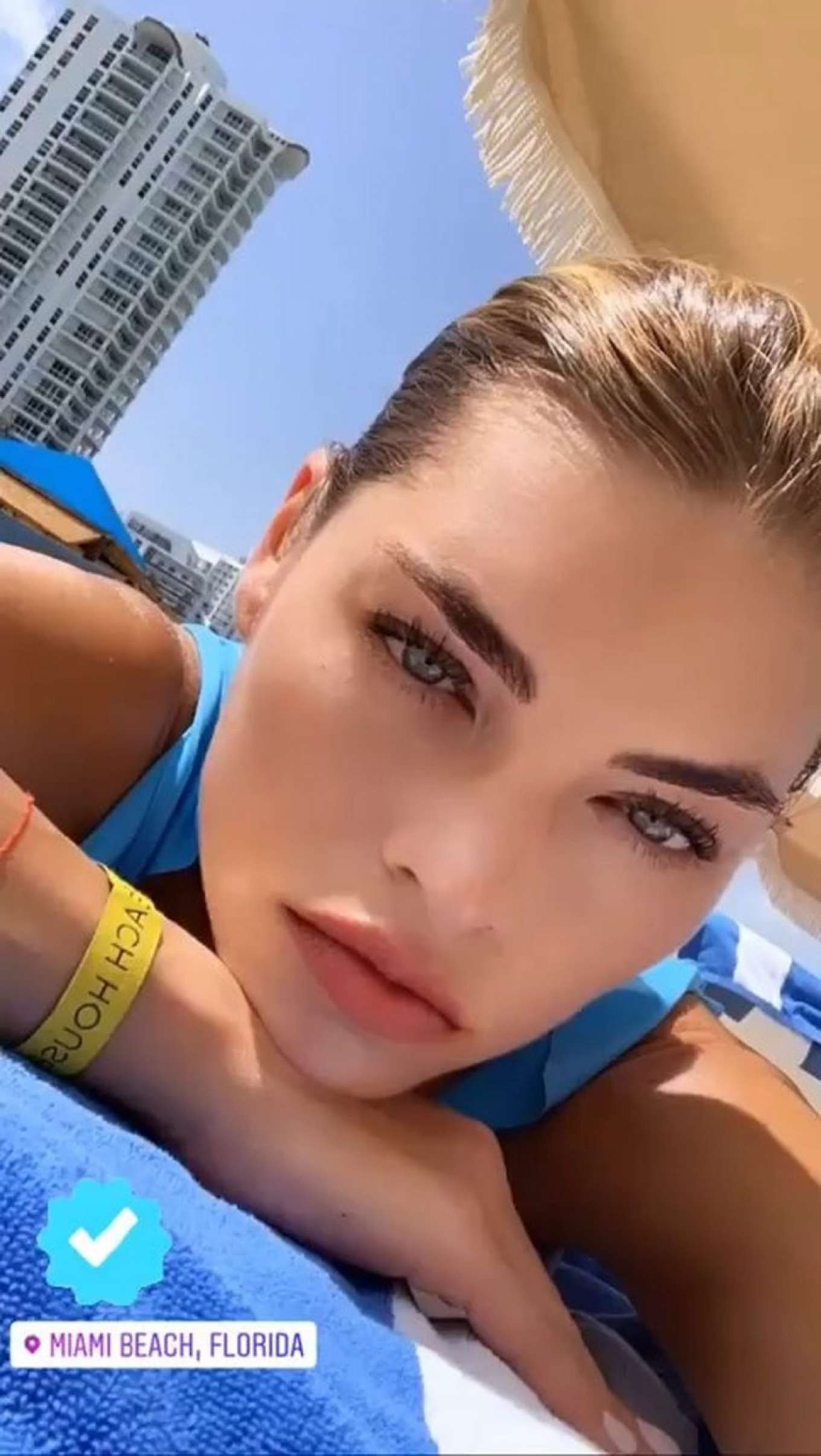 Anastasia Grik in Blue Bikini at the beach in Miami