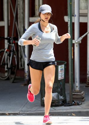 Andi Dorfmanin shorts jogging in New York City