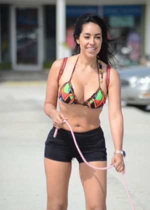 Andrea Calle in Bikini Top and Shorts - Rollerblading with her bulldog in Miami