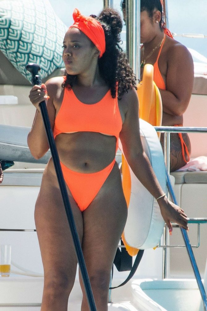 Angela Simmons in Orange Bikini on the yacht in Barbados