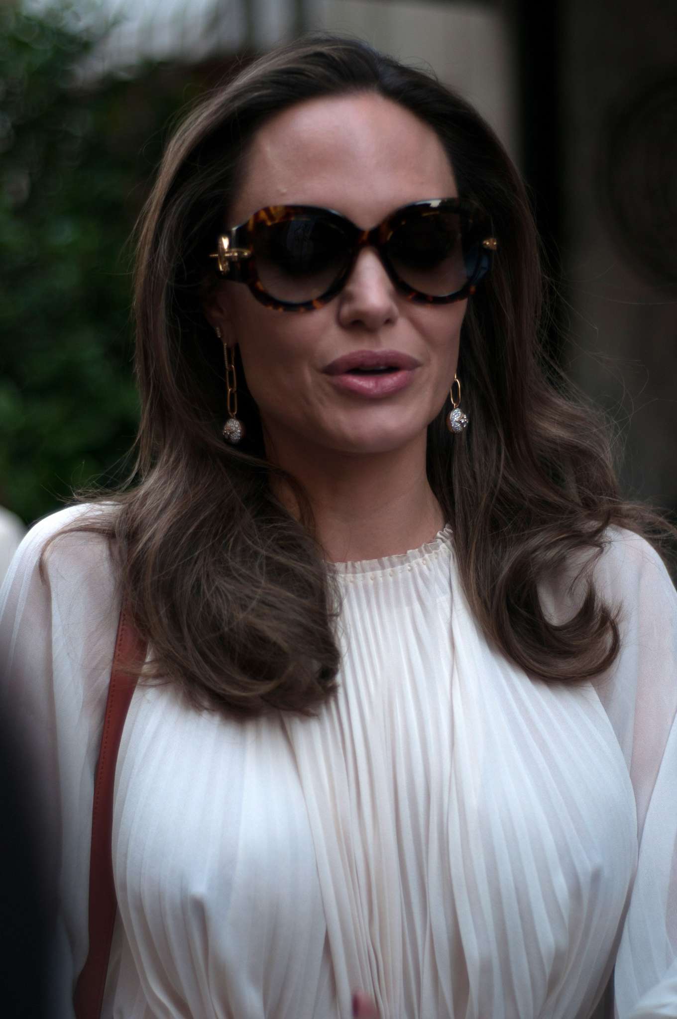 Angelina Jolie in White Outfit - Out in Paris. 