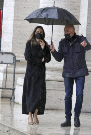 Angelina Jolie - Spotted in Rome under heavy rain