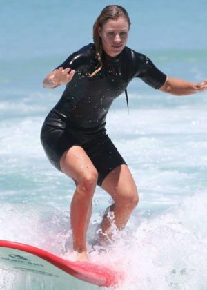 Angelique Kerber - Surfing lesson at Trigg Beach in Perth