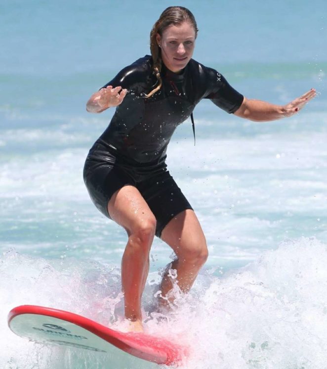 Angelique Kerber - Surfing lesson at Trigg Beach in Perth