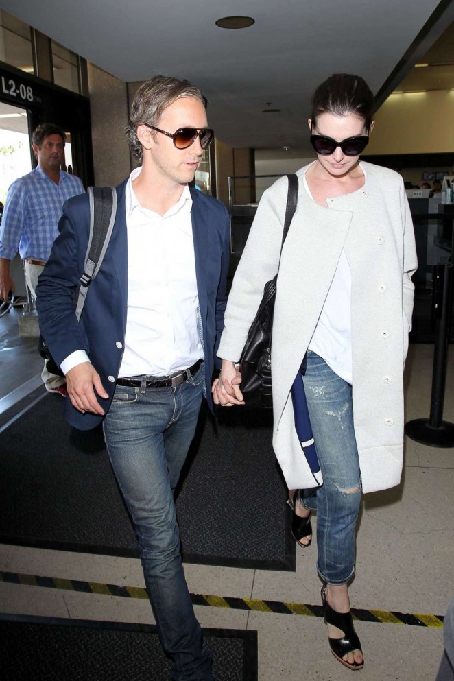 Anne Hathaway and Adam Shulman at LAX Airport in LA