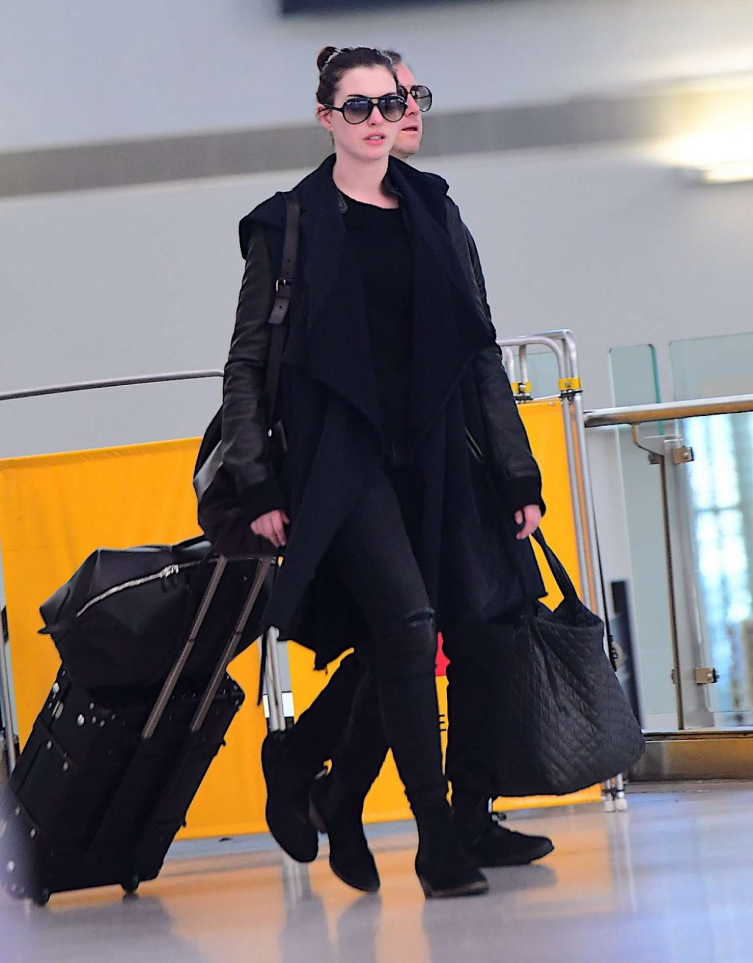 Anne Hathaway - Arrive at JFK Airport in New York