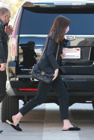 Anne Hathaway - Dressed in all black ahead of a business meeting in Los Angeles