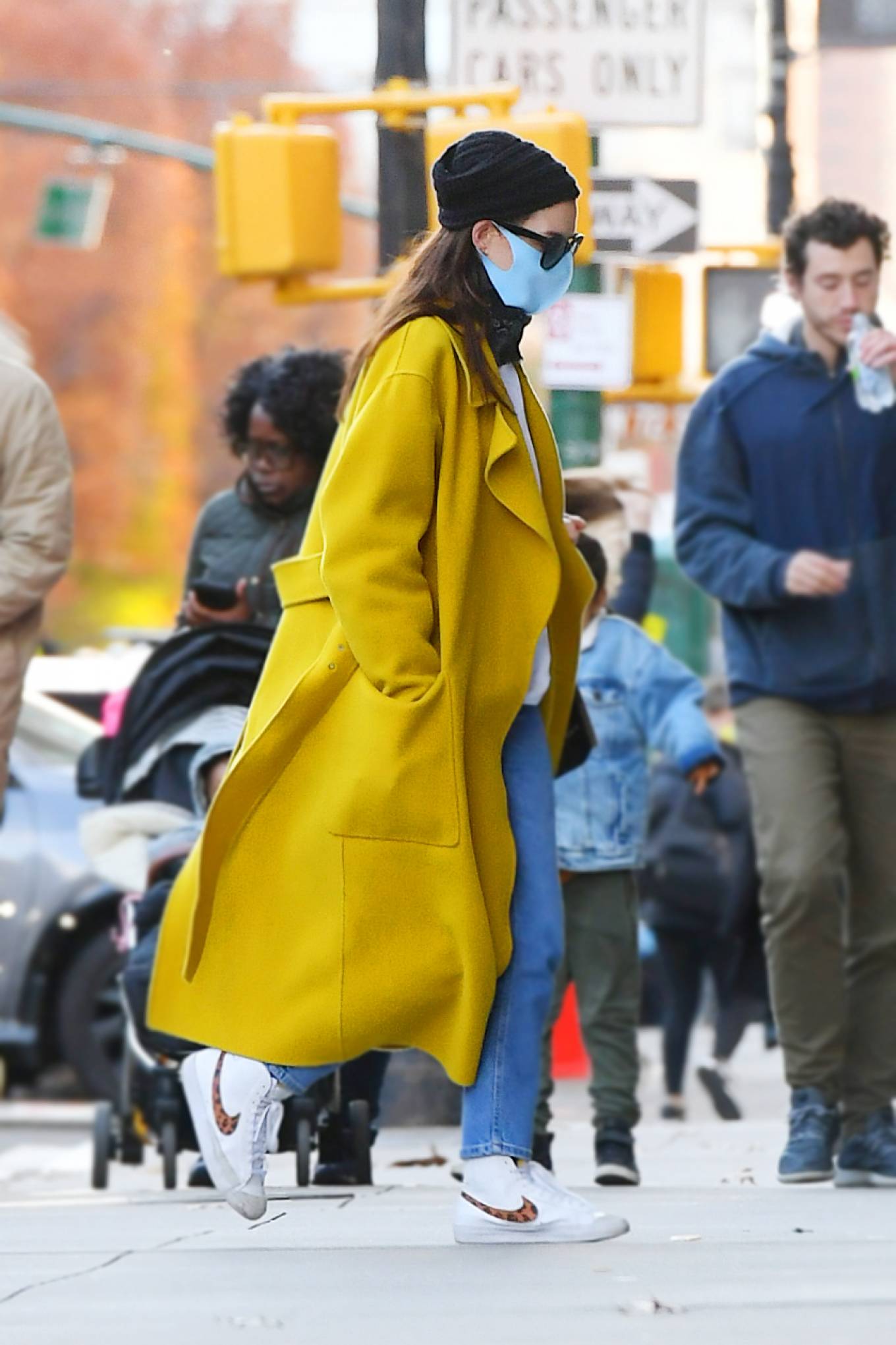 Anne Hathaway - In a yellow coat spotted out and about in New York City