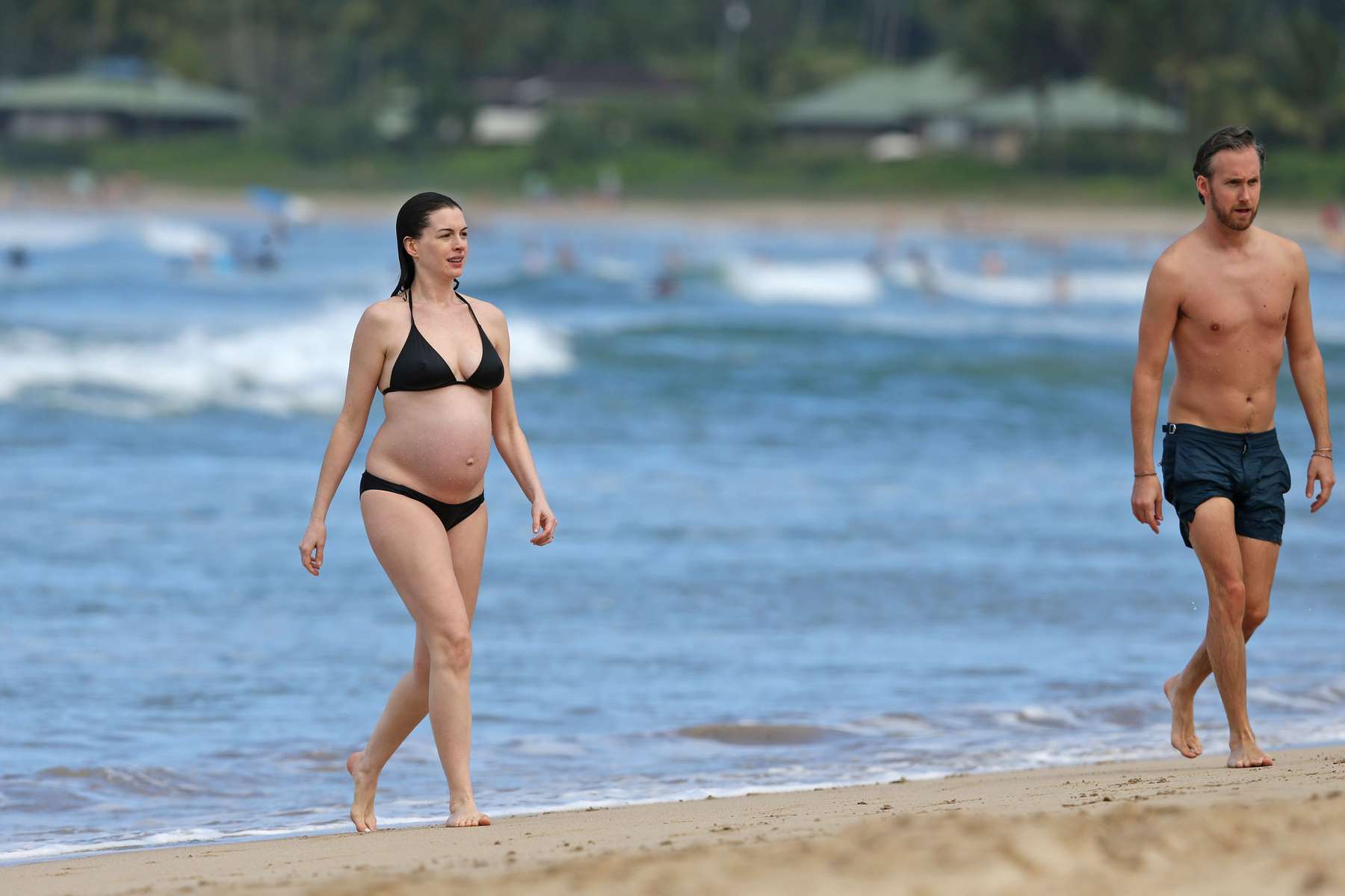 Anne Hathaway in Black Bikini in Hawaii. 