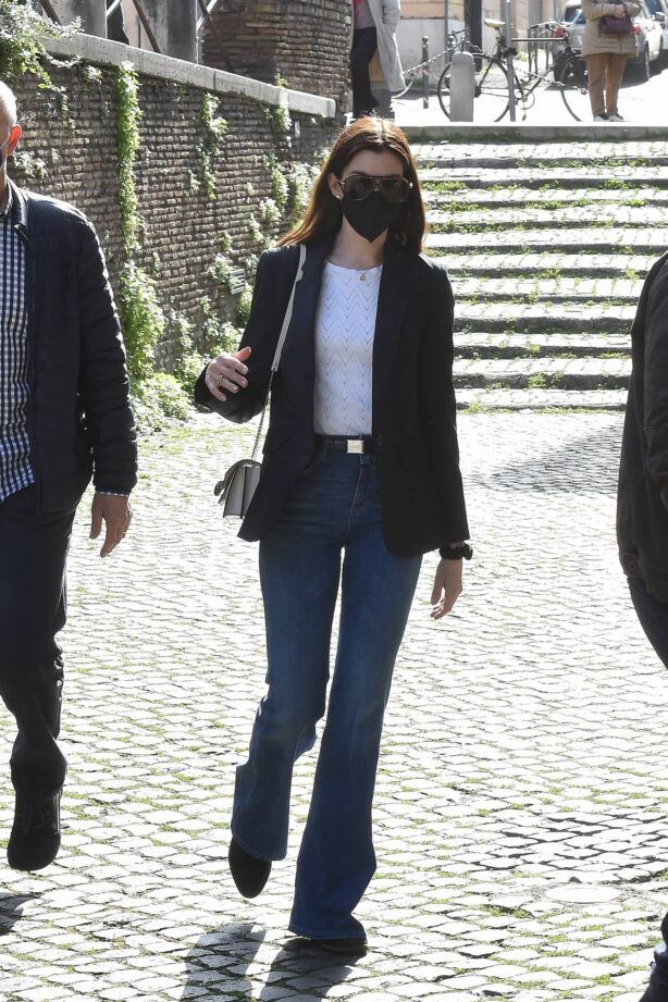 Anne Hathaway - In casual denim style visits San Clemente Basilica in Rome