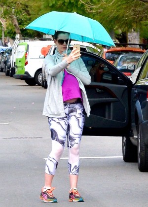 Anne Hathaway out on a rainy day in Beverly Hills