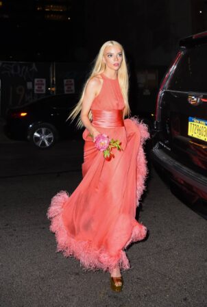 Anya Taylor-Joy - In orange dress leaving the Rockefeller Center after hosting SNL in New York