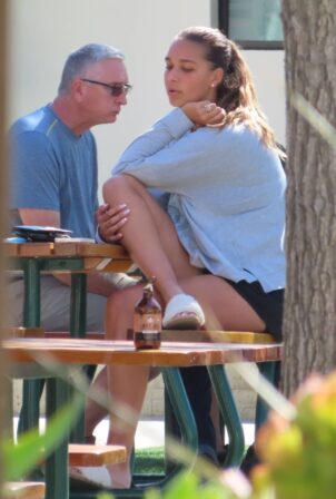 April Love Geary - Enjoys a smoothie with a friend in Malibu