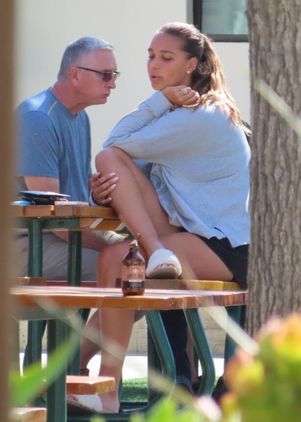 April Love Geary - Enjoys a smoothie with a friend in Malibu