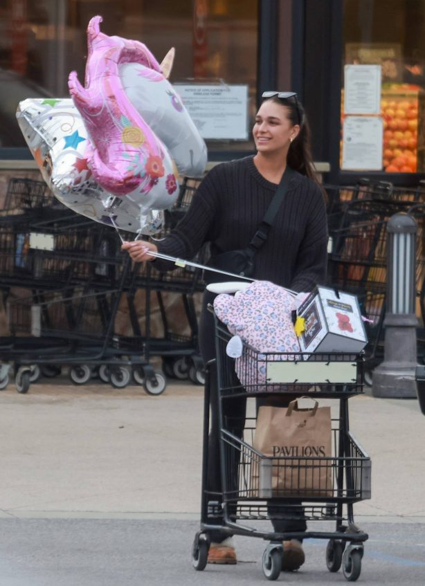 April Love Geary - Picks up groceries and balloons for her daughter's birthday in Malibu