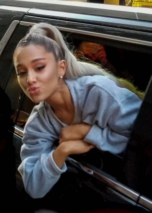 Ariana Grande - Hangs out of the window to see fans in New York