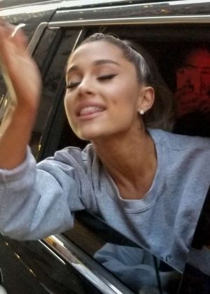 Ariana Grande – Hangs out of the window to see fans in New York – GotCeleb